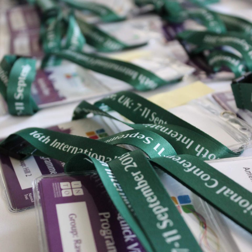 Conference badges at INTO Cambridge 2015