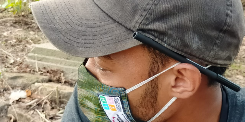 Conservation worker in Indonesia uses a mask provided by a TAP-INTO covid grant