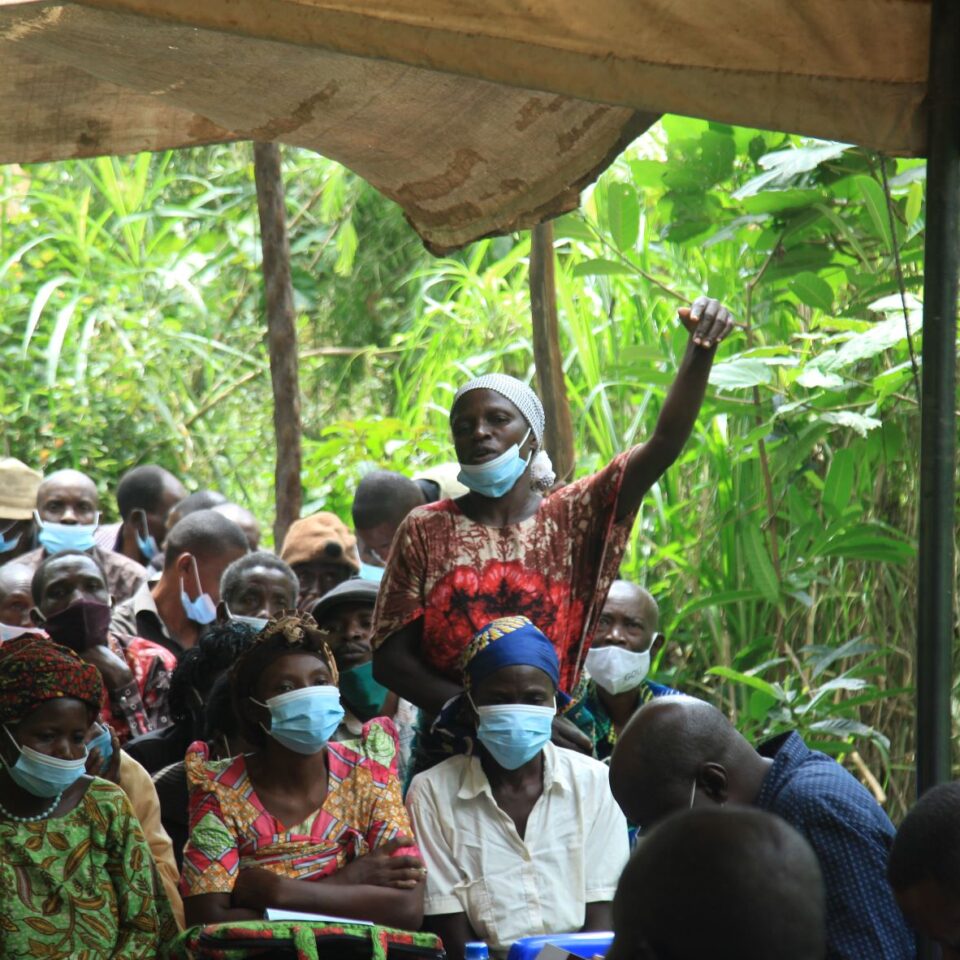 A community member shares views during the awareness meeting (1)