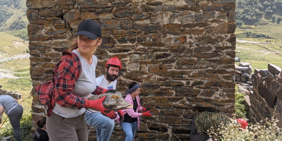 Volunteers clear Tsiskarauli Tower site and recover dry stones from site for rehabilitation