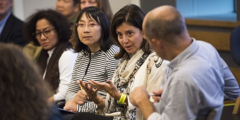 ASK INTO programme participants talking in a group