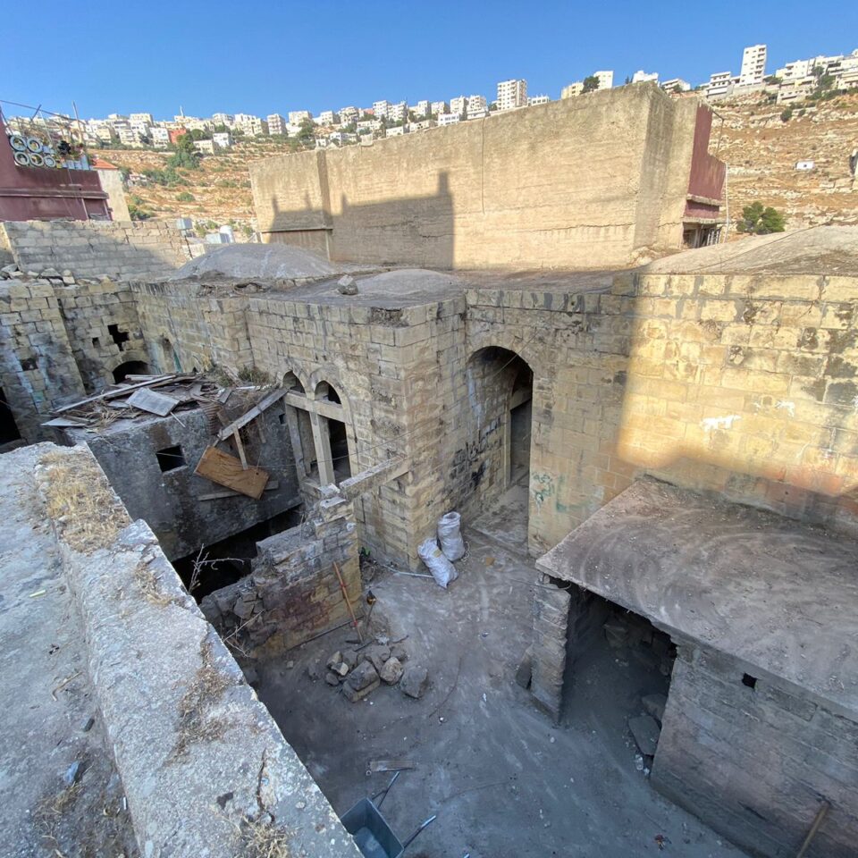 Bayt al Jaghbeer in Jordan showing the site cleared of rubbish before restoration