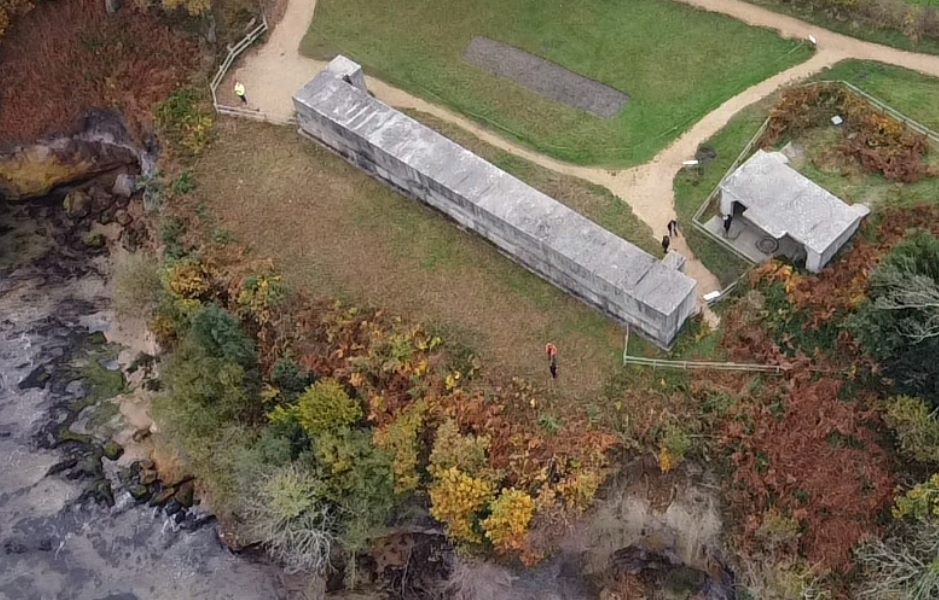 building close to a coastline to show coastal adaptation