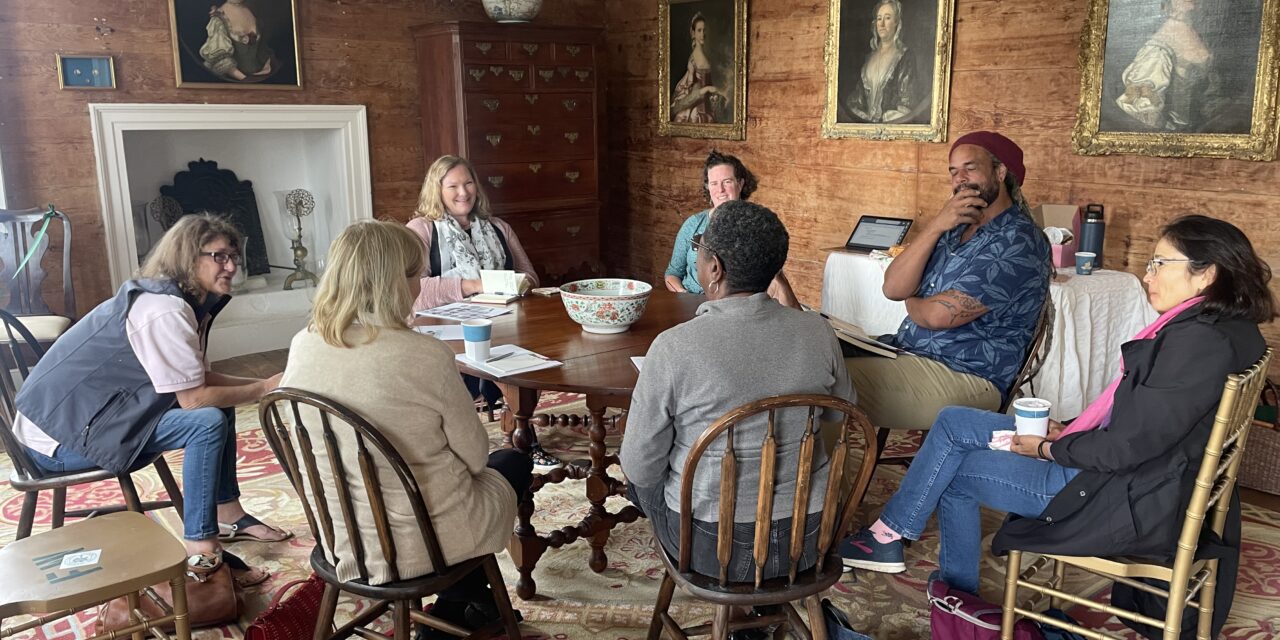 RISE programme participants meeting in an historic interior