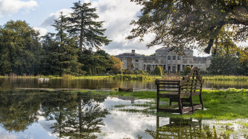 The rear garden under flood water in autumn at Shugborough Estate, Staffordshire