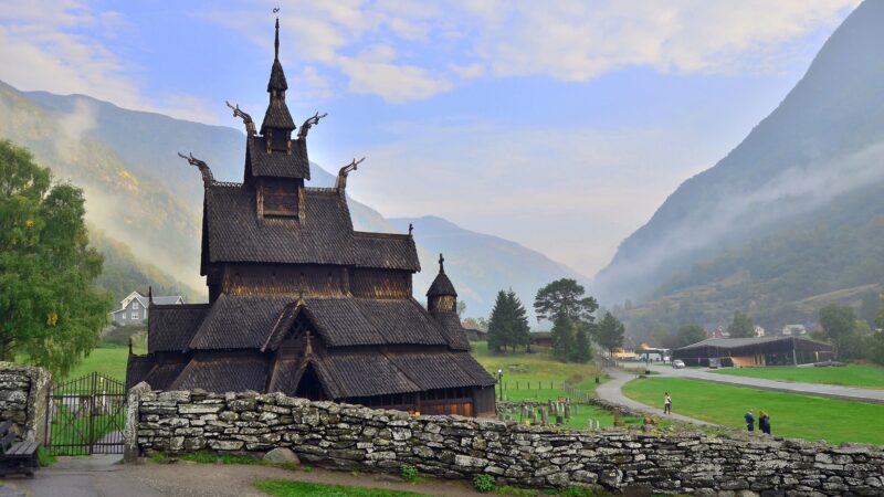 Borgund church in Norway - a black wooden church in a mountainous landscape