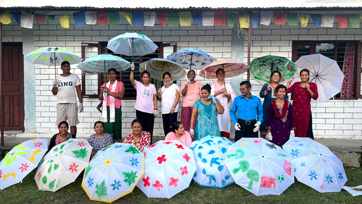 a group of people with colourful umbrellas