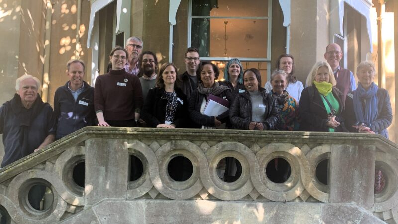 a group of people on the balcony of Fairfield House in Bath
