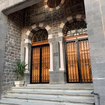 two arched doorways at the entrance to the Ghassania Theatre in Homs, Syria