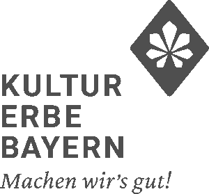 a dark grey and white logo for Kultur Erbe Bayern with a rhombus shape containing a lea motif