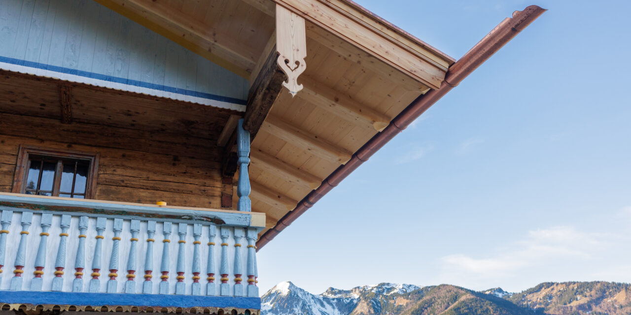 a section of a wooden cabin building in traditional Bavarian alpine style