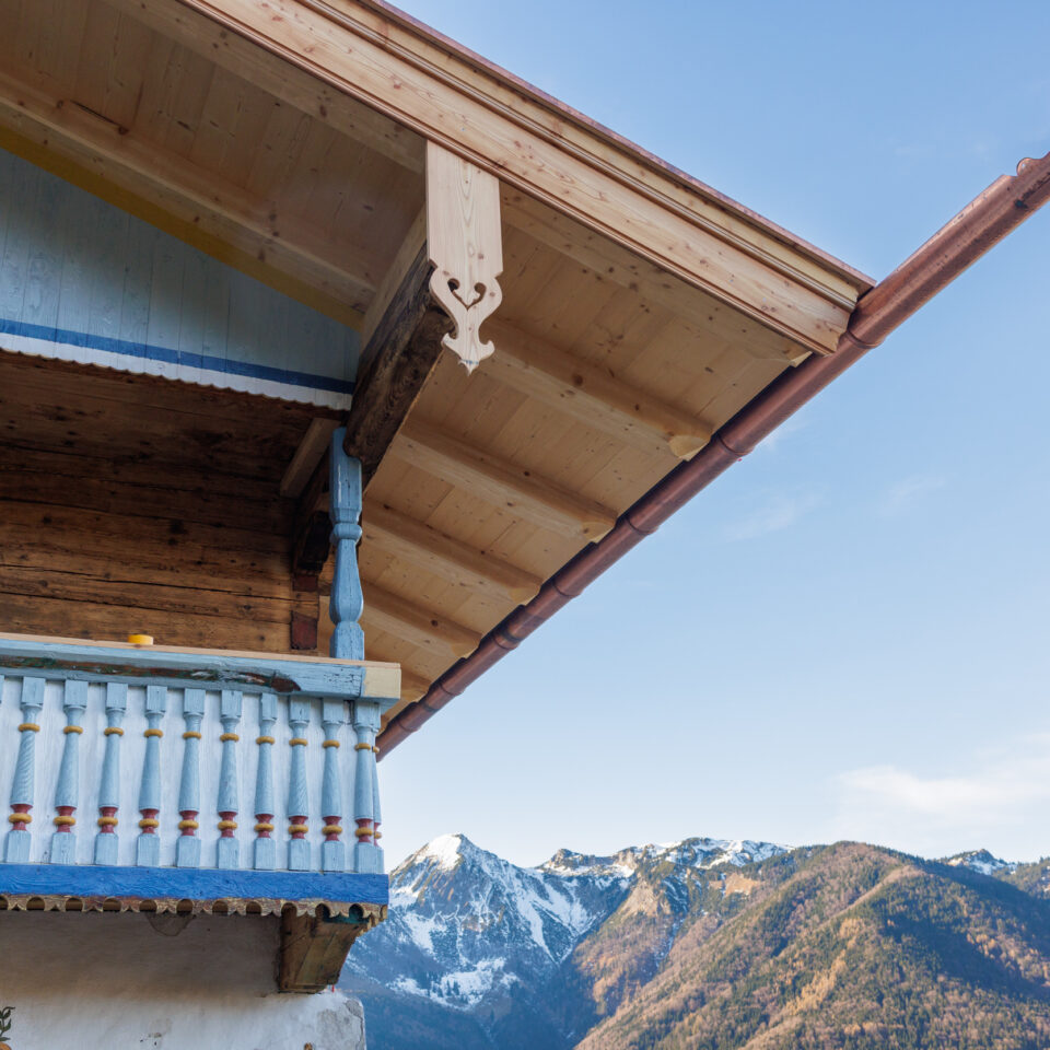 a section of a wooden cabin building in traditional Bavarian alpine style