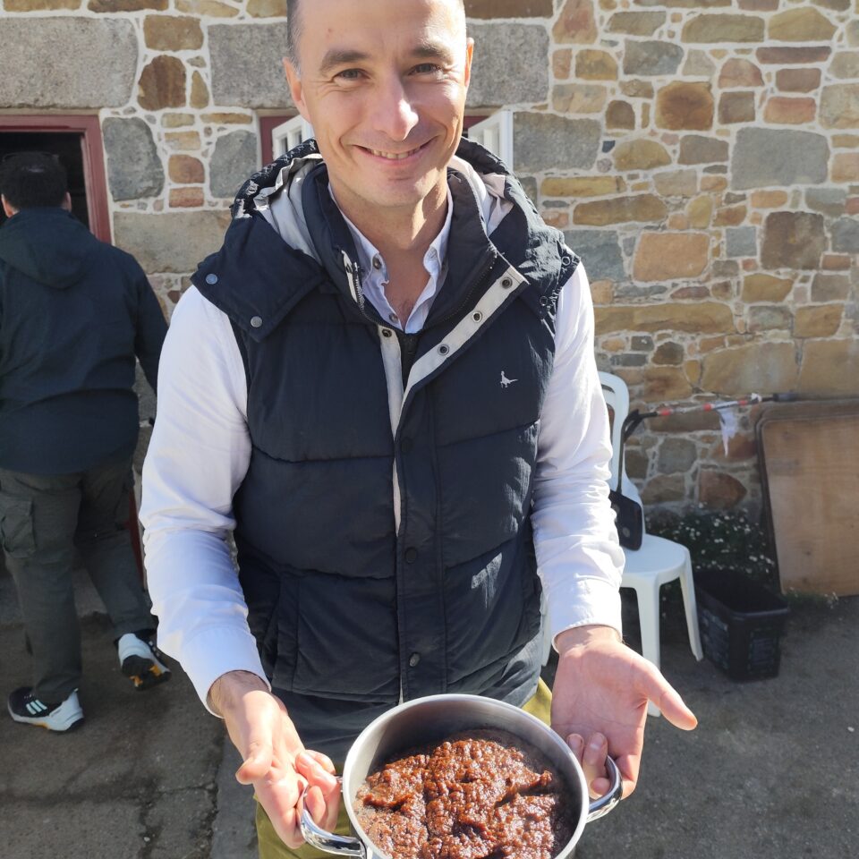 Alan le Maistre, CEO of NT Jersey holding a pot of Black Butter
