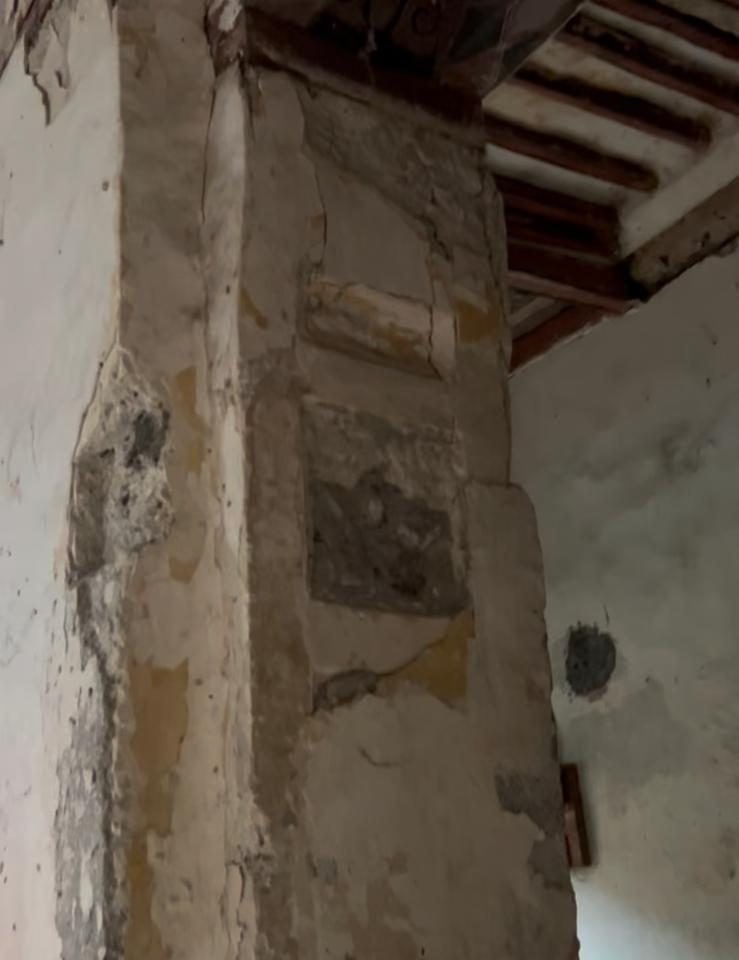 Carved wall niches which have been filled in previously